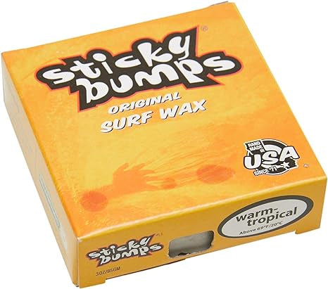 Sticky Bumps Warm/Tropical Surfboard Wax bar in original packaging, designed for grip in warm to tropical water temperatures.