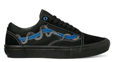 Vans Old Skool in black with blue wave design, featuring suede and canvas upper with reinforced toe cap.